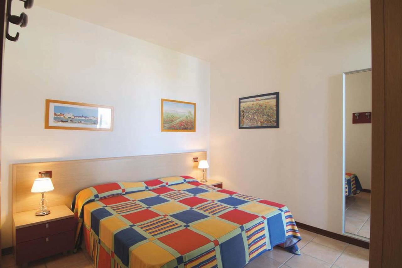 Altanea Apartments Con Piscina Каорле Экстерьер фото